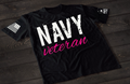 Black Navy Veteran women’s T-shirt featuring bold white and pink military service text graphic design on the front