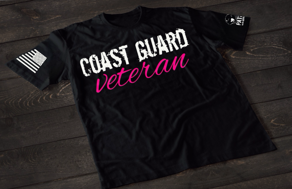 Black Coast Guard Veteran women’s T-shirt featuring bold white and pink military service text graphic design on the front